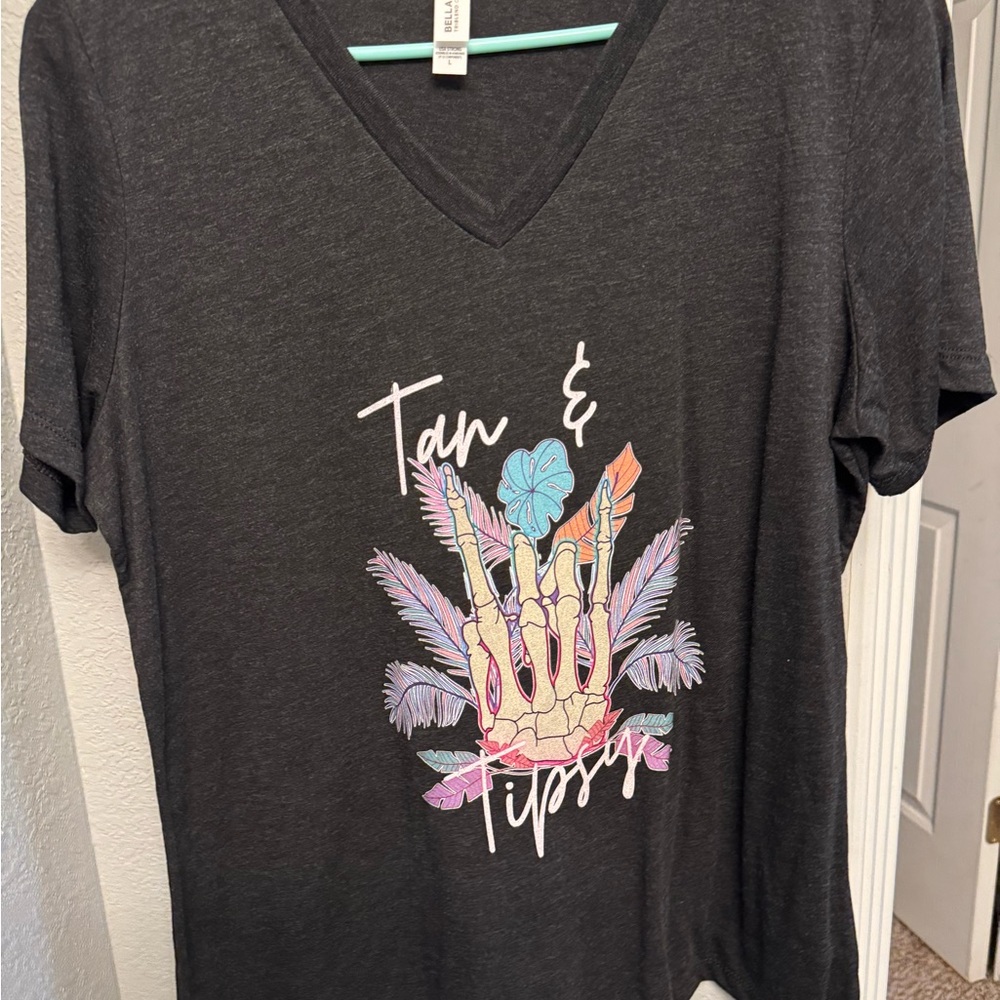 Black Graphic Tee with Skeleton and Feathers